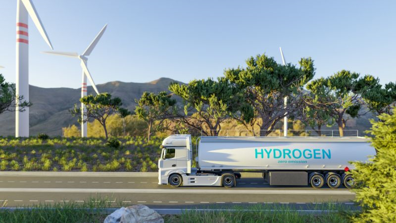 A truck loaded with hydrogen gas is driving on the road