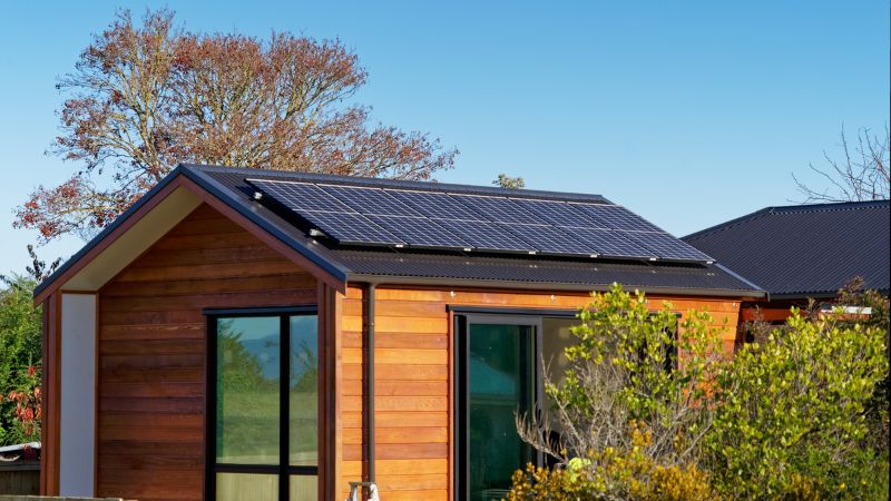 A house with solar cells on the roof