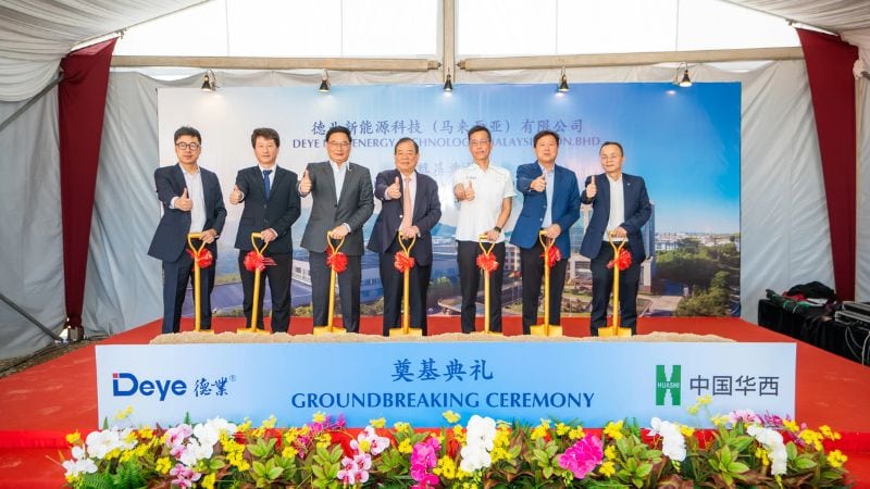 1. Deepblue energy technology groundbreaking ceremony with executives holding shovels, celebrating renewable energy innovation in Malaysia and China.