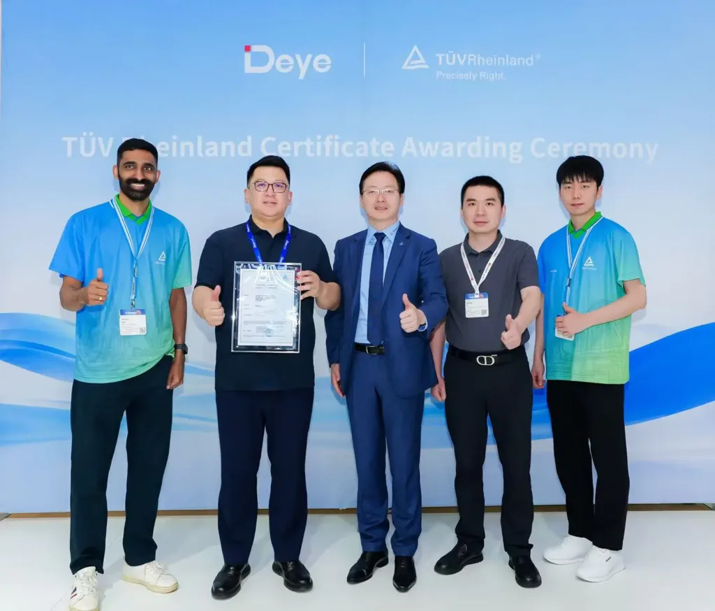 Deye and TÜV Rheinland representatives at the ceremony