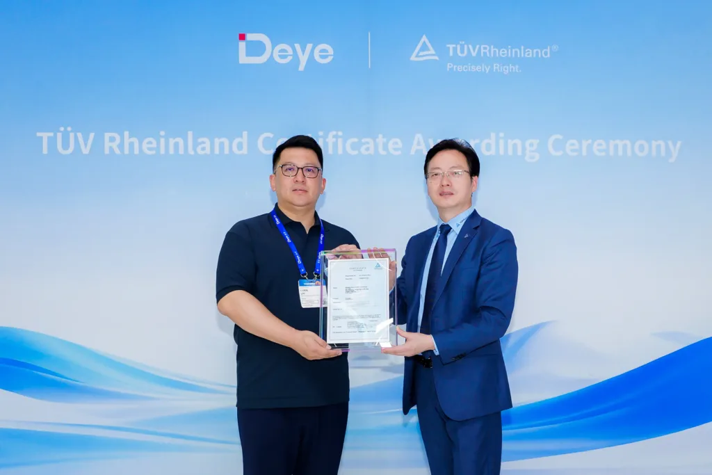 Mr. Luxin Liu (left) receives the energy storage product certification from Mr. Weichun Li (right)